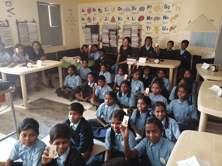 Students using Class Saathi clickers in classroom