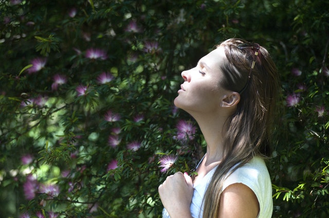 woman breathing mindfully
