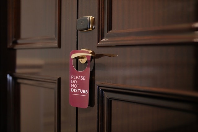 Please do not disturb sign on door knob