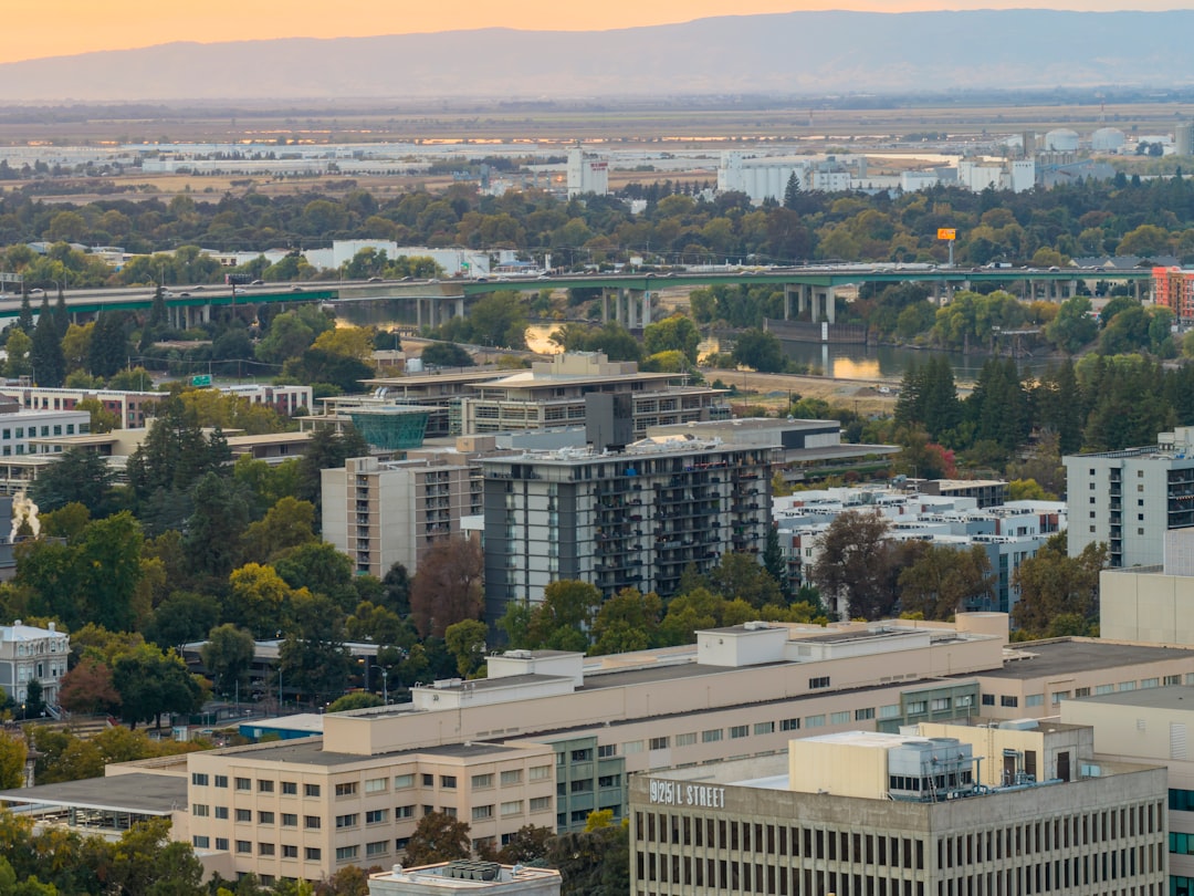 Aerial view of a sprawling city with buildings and bridges.